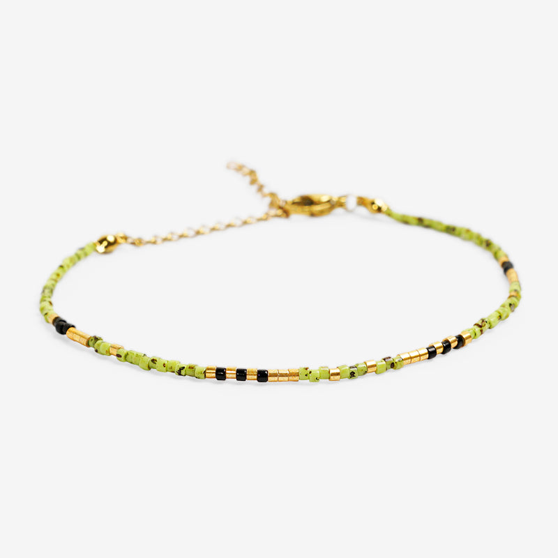 PULSERA AJUSTABLE MIYUKI CRISTAL + BROCHE DE ACERO INOXIDABLE BAÑADO EN ORO 18K "ALFA DRACO"