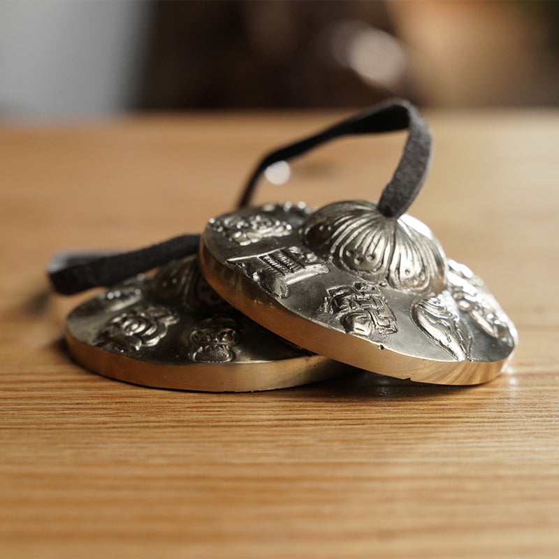 Símbolos sagrados tibetanos de Tingsha (S)