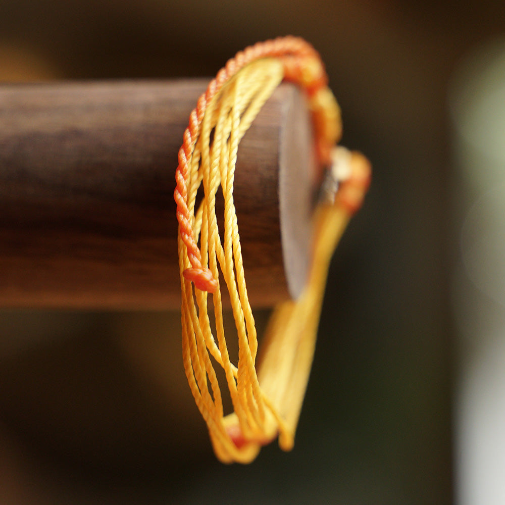 PULSERA AJUSTABLE HILO ENCERADO “GALAXIA GIRASOL”