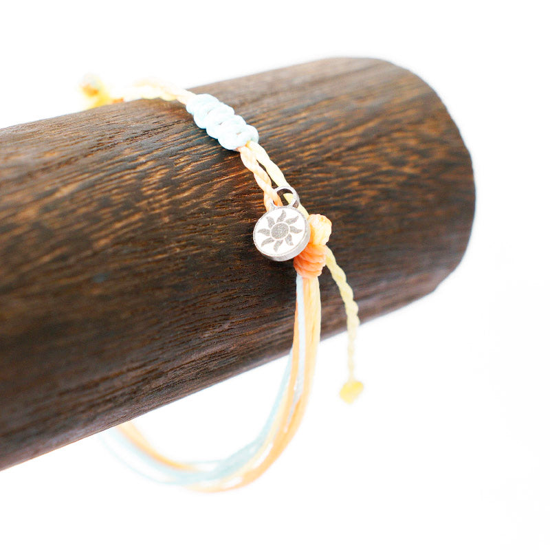 PULSERA AJUSTABLE HILO ENCERADO “LUZ DEL AMANECER”