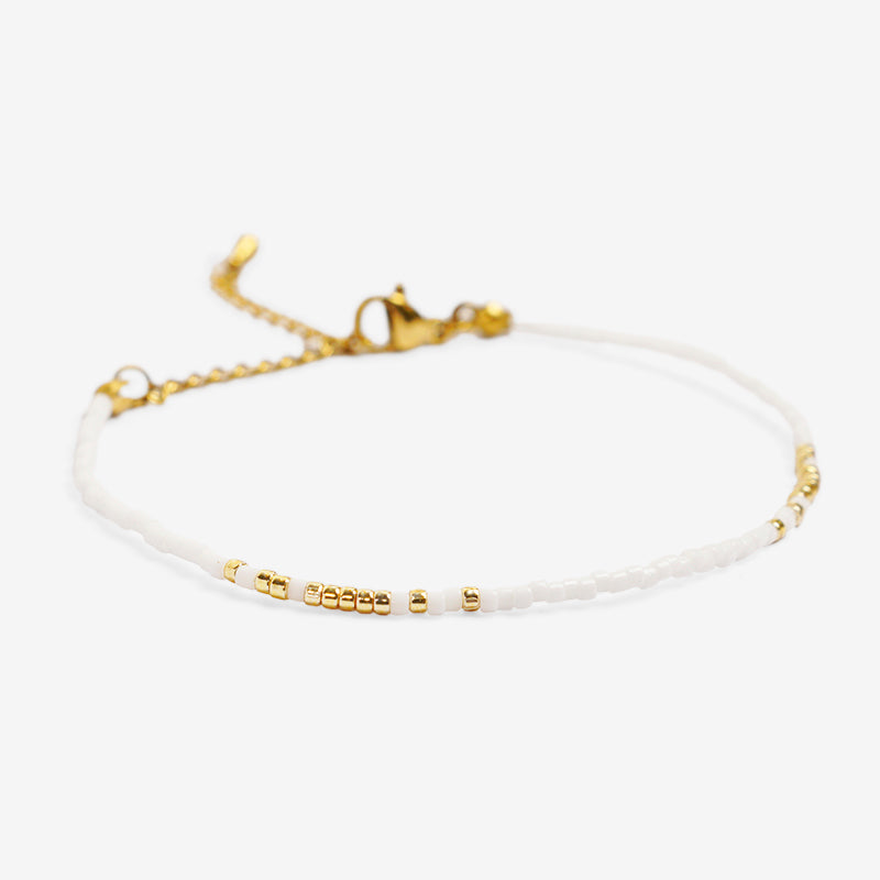 PULSERA AJUSTABLE MIYUKI CRISTAL + BROCHE DE ACERO INOXIDABLE BAÑADO EN ORO 18K "SABIDURÍA"
