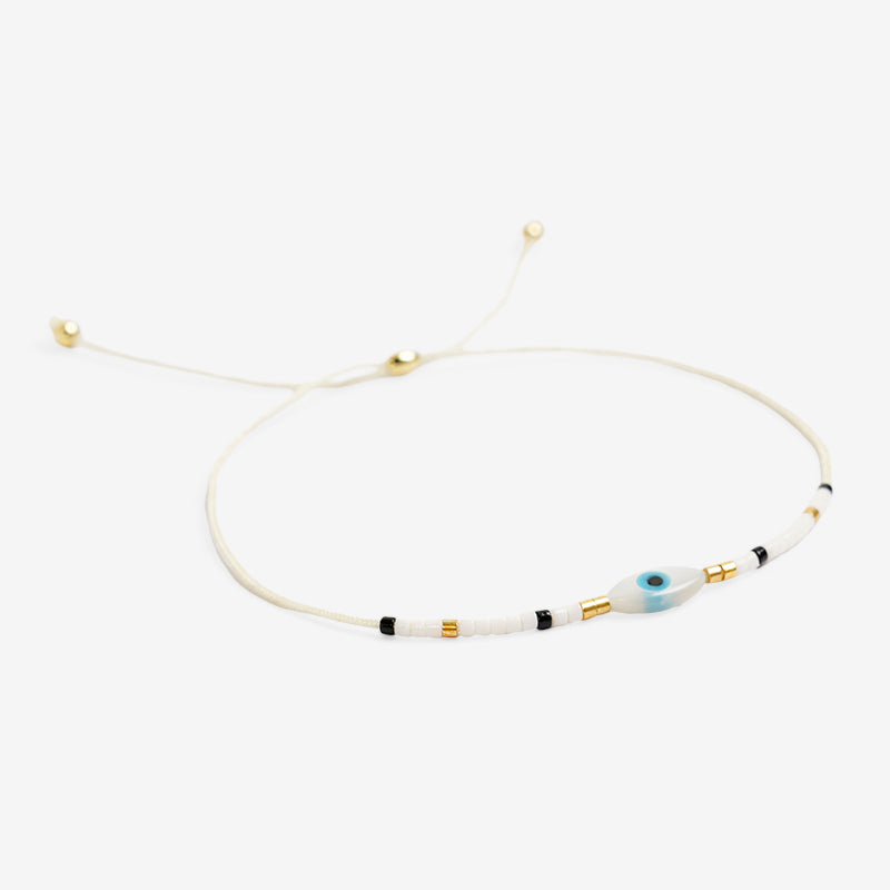 PULSERA AJUSTABLE MIYUKI CRISTAL "OJO BLANCO"