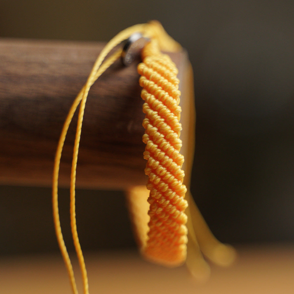 PULSERA AJUSTABLE TRENZADA HILO ENCERADO “TIERRA ANCESTRAL”