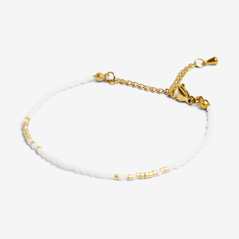 PULSERA AJUSTABLE MIYUKI CRISTAL + BROCHE DE ACERO INOXIDABLE BAÑADO EN ORO 18K "SABIDURÍA"