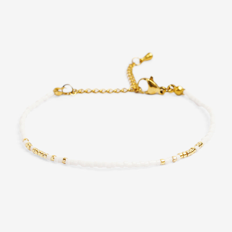 PULSERA AJUSTABLE MIYUKI CRISTAL + BROCHE DE ACERO INOXIDABLE BAÑADO EN ORO 18K "SABIDURÍA"